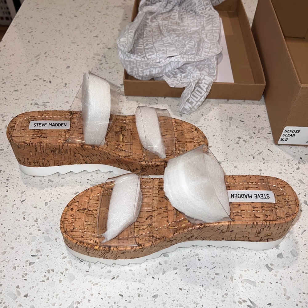 Steve Madden “Defuse” Clear Sandal & Cork Wedge